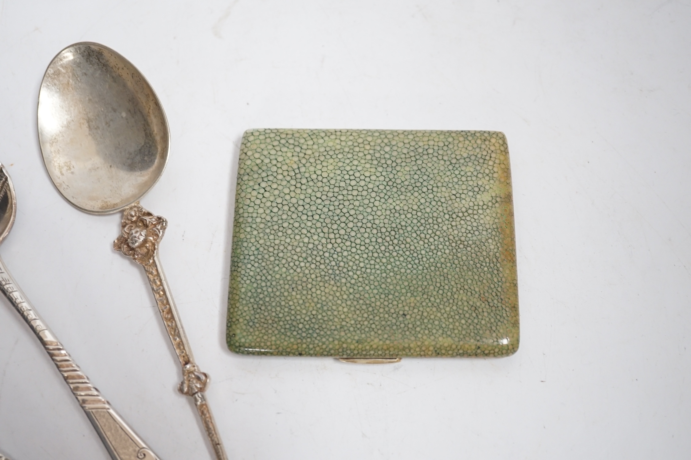 A George III Scottish provincial table spoon, with later decoration, Robert Keay I, Perth, circa 1790, 22.5cm, together with a George III silver table spoon with similar decoration, a continental white metal spoon and a